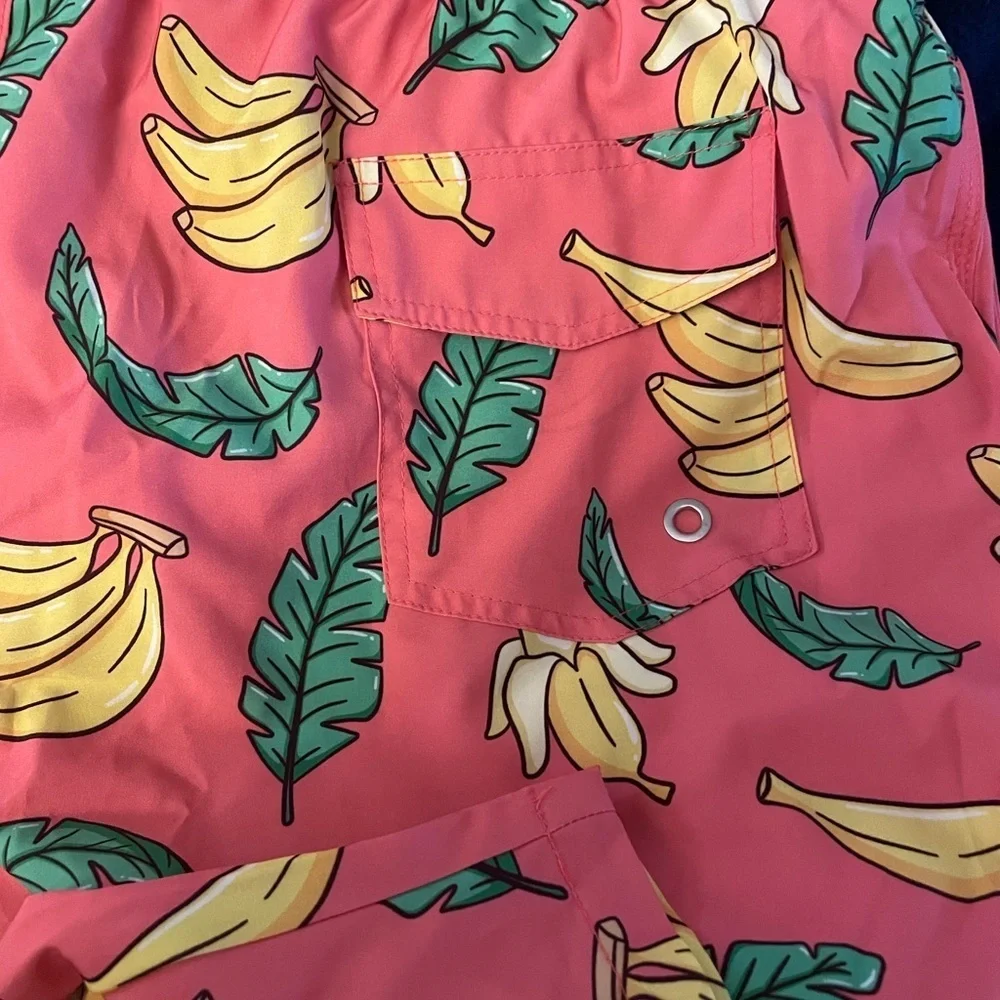 New XXL Men’s Board Shorts Banana pattern.  Built in mash, brief Quick drying